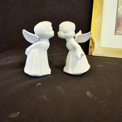 Smaller Angel figures and a framed picture of Angel