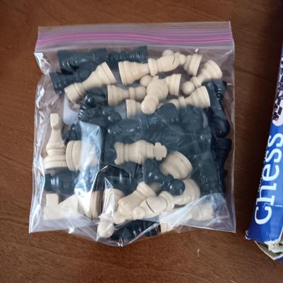 CHESS SET, BATTLE OF THE BRAINS GAME AND A KINDLE CARRIER WITH EARBUDS