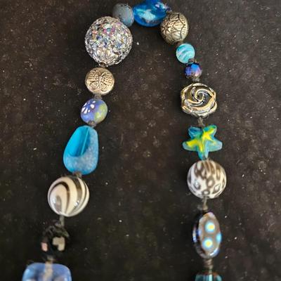 Nice musical wooden Jewlery box with an assortment of Jewlery