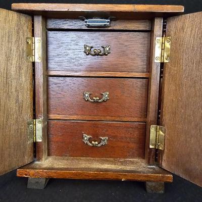 Nice musical wooden Jewlery box with an assortment of Jewlery
