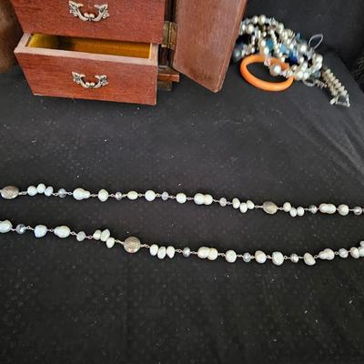 Nice musical wooden Jewlery box with an assortment of Jewlery
