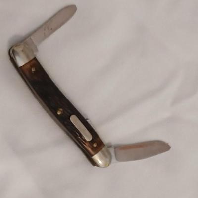 Collection of small vintage pocket knives - Eaton bank