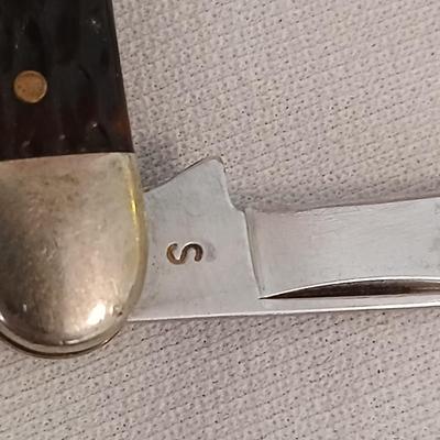 Collection of small vintage pocket knives - Eaton bank