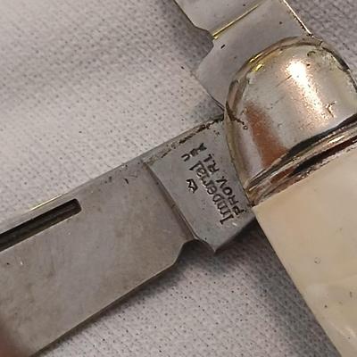 Collection of small vintage pocket knives - Eaton bank