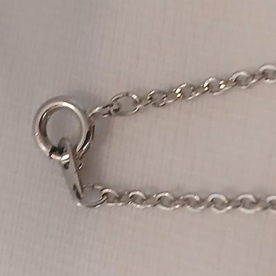 Vintage AVON Moon Shimmer ring with silver toned clip on earrings and two necklaces