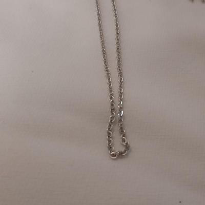 Vintage AVON Moon Shimmer ring with silver toned clip on earrings and two necklaces