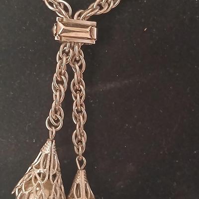 Two women's rings, a necklace and earrings - all silver-toned