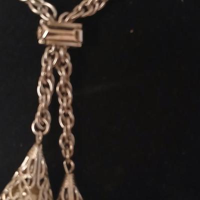 Two women's rings, a necklace and earrings - all silver-toned