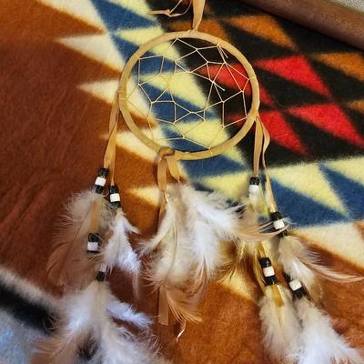 Native American Angel figure with Native light weight blanket and a framed Charles Russel Print