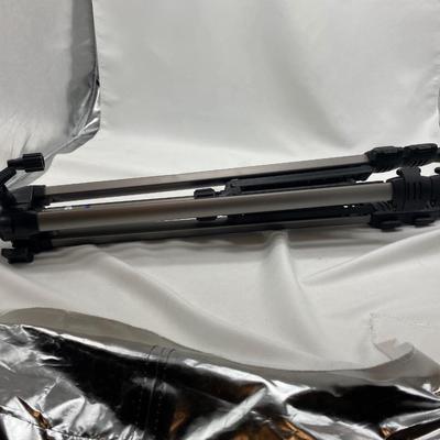FUJI DIGITAL CAMERA IN A CASE AND A TRIPOD