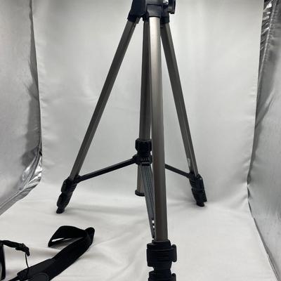 FUJI DIGITAL CAMERA IN A CASE AND A TRIPOD