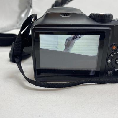 FUJI DIGITAL CAMERA IN A CASE AND A TRIPOD
