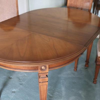 Dining Table with 2 Leaves and Cane Back Chairs