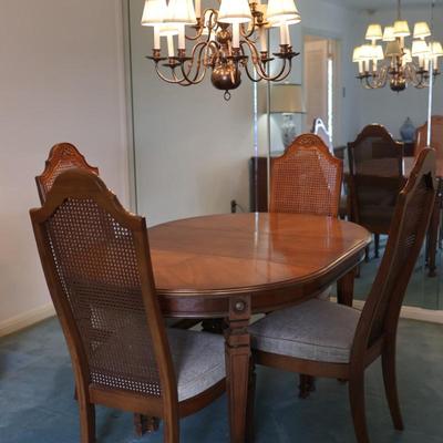 Dining Table with 2 Leaves and Cane Back Chairs