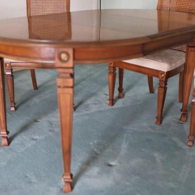Dining Table with 2 Leaves and Cane Back Chairs