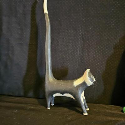 Cast Iron Cat door stop, Cat-stained glass suncatcher and a wooden kitty with a long tail