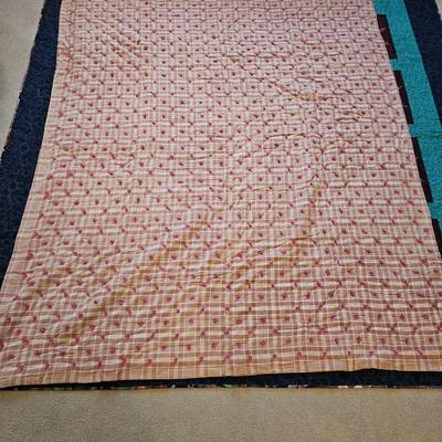 Two handmade quilts - Anne Russell Legacy Quilt Quilted by Susie Huschka and a Dammit doll