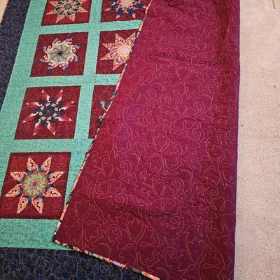 Two handmade quilts - Anne Russell Legacy Quilt Quilted by Susie Huschka and a Dammit doll