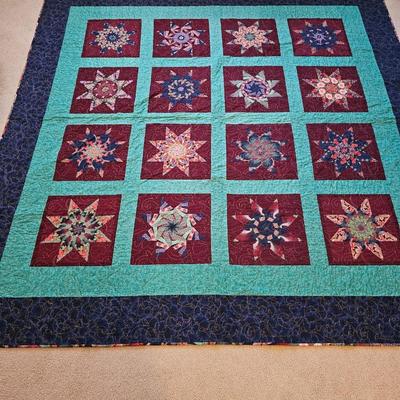 Two handmade quilts - Anne Russell Legacy Quilt Quilted by Susie Huschka and a Dammit doll