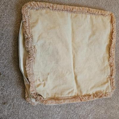 Four Vintage Crewel Embroidery Pillowcases with a variety of wicker baskets and a framed floral embroidered wall art
