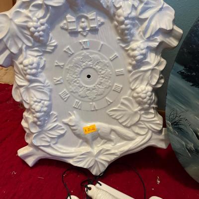 Hand-painted clock, cardboard prints, misc wall art