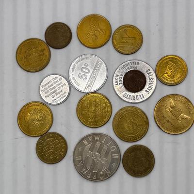 Sale Photo Thumbnail #2: Includes tokens for arcade game play, shoe shine at a Marriot Hotel, Restaurant tokens, Ice capes, Film processing, and Good Luck Tokens.  Most look to be in very good, near-new condition.