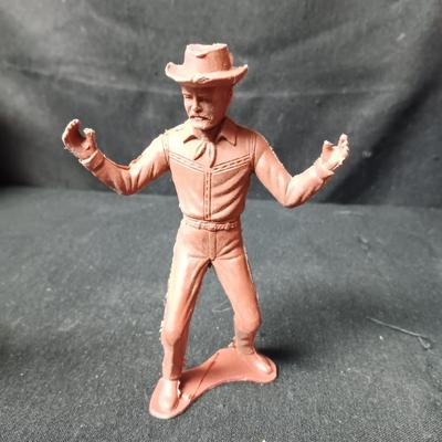 A VARIETY OF VINTAGE TOY COWBOYS AND MORE