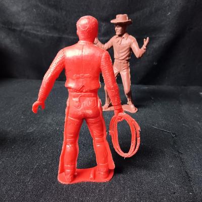 A VARIETY OF VINTAGE TOY COWBOYS AND MORE