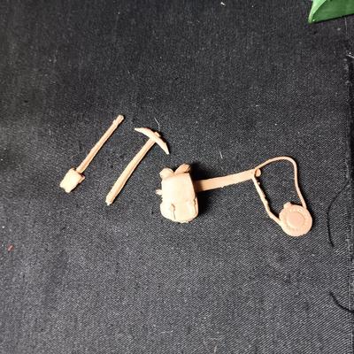 A VARIETY OF VINTAGE TOY COWBOYS AND MORE