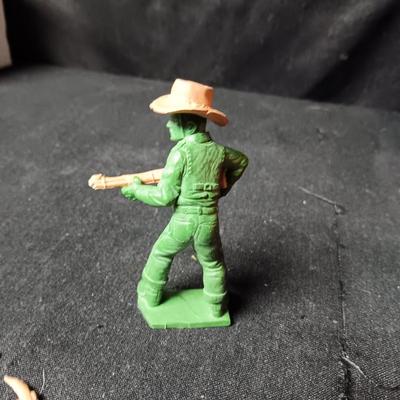 A VARIETY OF VINTAGE TOY COWBOYS AND MORE