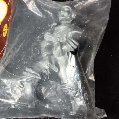 1 A OK ASTRONAUT TO THE MOON FIGURE IN PACKAGE AND 1 USED