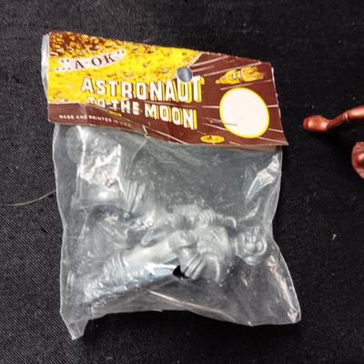 1 A OK ASTRONAUT TO THE MOON FIGURE IN PACKAGE AND 1 USED
