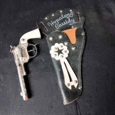 HOPALONG CASSIDY HOLSTER AND A WILSON RODEO CAP GUN
