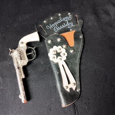 HOPALONG CASSIDY HOLSTER AND A WILSON RODEO CAP GUN