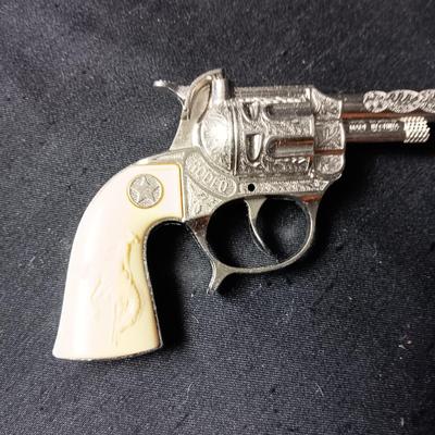 HOPALONG CASSIDY HOLSTER AND A WILSON RODEO CAP GUN