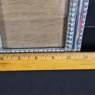 LOT 285: Star Style at the Academy Awards Book, Frames, and Set of Four Victorian Style Dress Miniatures