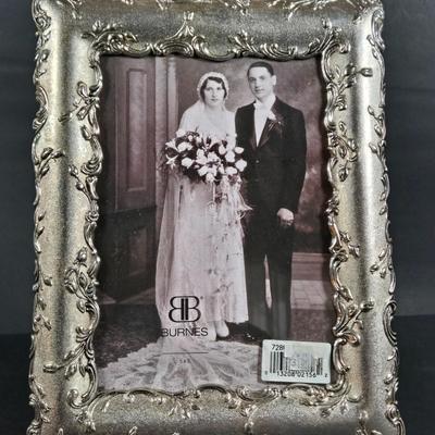 LOT 285: Star Style at the Academy Awards Book, Frames, and Set of Four Victorian Style Dress Miniatures