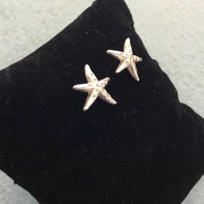 Cute silver toned rhinestone starfish stud earring