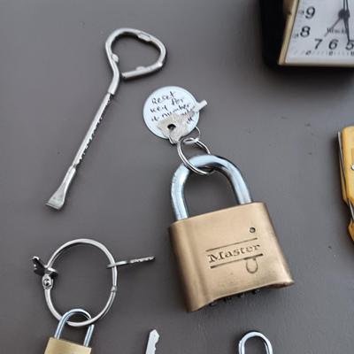 PADLOCKS, POCKET KNIVES AND TRAVEL CLOCK