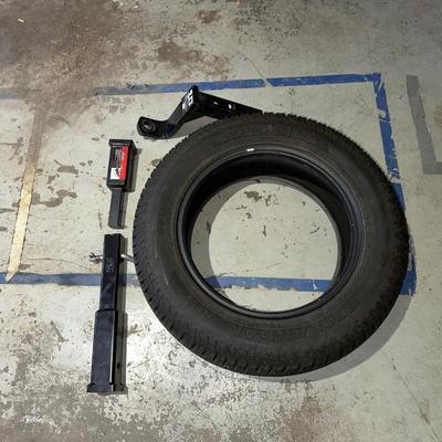 1 1/4" - 2" HITCH ADAPTER, 1 YOKOHAMA 225/65R17 TIRE AND A HITCH