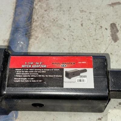 1 1/4" - 2" HITCH ADAPTER, 1 YOKOHAMA 225/65R17 TIRE AND A HITCH