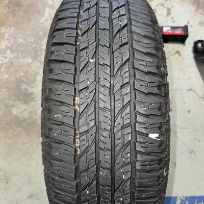 1 1/4" - 2" HITCH ADAPTER, 1 YOKOHAMA 225/65R17 TIRE AND A HITCH