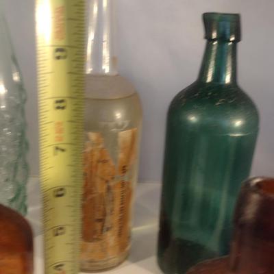 Collection of Vintage Glass Bottles- Clear, Blue, Green, and Amber