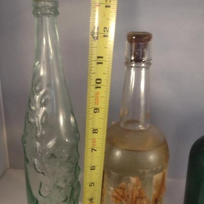 Collection of Vintage Glass Bottles- Clear, Blue, Green, and Amber
