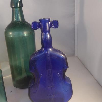 Collection of Vintage Glass Bottles- Clear, Blue, Green, and Amber
