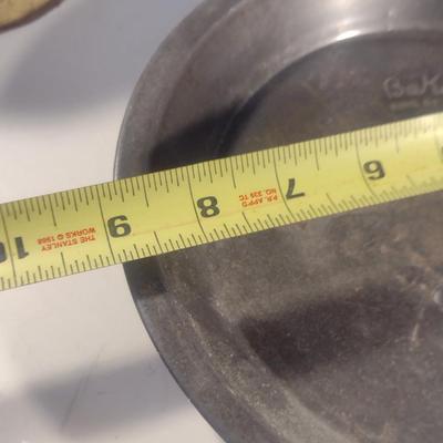Collection of Vintage Metal Pie Pans and Tin Cans