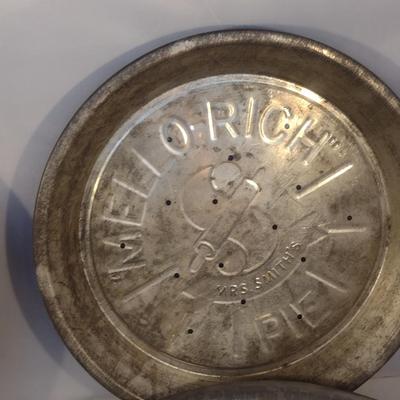 Collection of Vintage Metal Pie Pans and Tin Cans