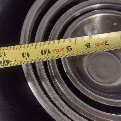 Six Stainless Mixing Bowls