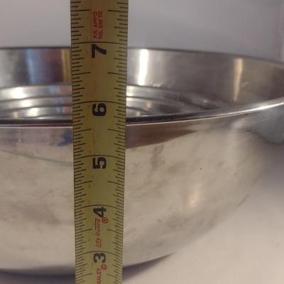 Six Stainless Mixing Bowls