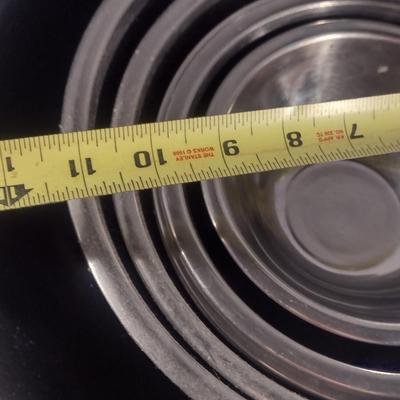 Six Stainless Mixing Bowls